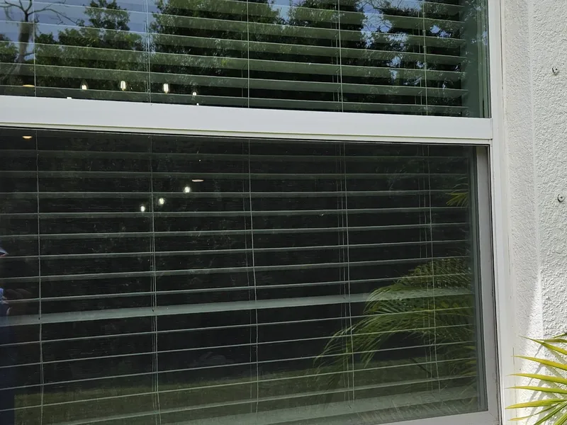 After window and screen cleaning Sarasota, clean glass and screen